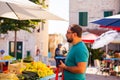 Man at a everyday morning outdoor market vegetable Royalty Free Stock Photo