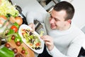 Man examines vegies Royalty Free Stock Photo