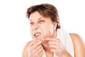 Man examining his stubble in mirror Royalty Free Stock Photo