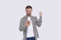 Man Excited Winning. Man Holding Phone. Winner. Man Won online Casino, Lottery Royalty Free Stock Photo