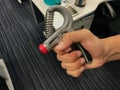 Man exercise his hand by strength handgrip to prevent office syndrome