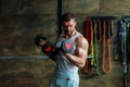Man exercising with barbell. Fit model lifting weight barbell, workout at gym. Workout with barbell. Man strong muscular Royalty Free Stock Photo