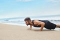 Man Exercising, Doing Push Up Exercises On Beach. Fitness Workout Royalty Free Stock Photo