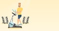 Man exercising on elliptical trainer.