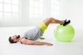 Man exercising with fitball Royalty Free Stock Photo