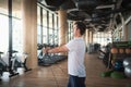 Man exercising in the gym on a pec deck machine for chest workout Royalty Free Stock Photo