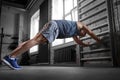 man exercising on gymnastics wall bars in gym Royalty Free Stock Photo