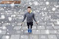 Man exercising with jump-rope outdoors Royalty Free Stock Photo