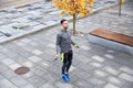 Man exercising with jump-rope outdoors Royalty Free Stock Photo