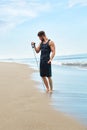 Man Exercising Outdoor, Doing Workout Exercise At Beach. Fitness Royalty Free Stock Photo