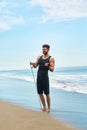 Man Exercising Outdoor, Doing Workout Exercise At Beach. Fitness Royalty Free Stock Photo