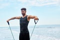 Man Exercising Outdoor, Doing Workout Exercise At Beach. Fitness Royalty Free Stock Photo