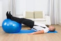 Man exercising on a pilates ball Royalty Free Stock Photo