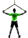 Man exercising suspension training trx silhouette Royalty Free Stock Photo