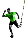 Man exercising suspension training trx silhouette Royalty Free Stock Photo