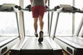 Man exercising on treadmill in gym Royalty Free Stock Photo