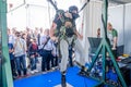 Man experimenter feels the installation simulator skydiving glasses with virtual reality and flight simulation computer program ha