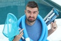 Man experimenting problems with swimming pool maintenance Royalty Free Stock Photo