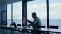 Man expert reading documents at marina seaport rear view. Manager at work Royalty Free Stock Photo