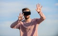 Man explore VR sky background. VR technology and future. VR communication. Exciting impressions. Gaming and