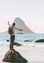 Man explorer enjoying sea view on empty beach Royalty Free Stock Photo