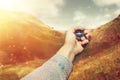 Man Explorer Searching Direction With Compass In Summer Mountains, Hand Point Of View Shot Royalty Free Stock Photo