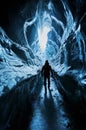 Man exploring an amazing glacial ice cave Royalty Free Stock Photo
