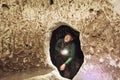 Man exploring caves in Derinkuyu underground city