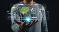 Artificial Intelligence Data Analysis Interface with Man Holding Futuristic Screens Displaying Brain and Charts Royalty Free Stock Photo