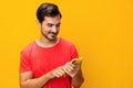 Happy man portrait phone communication smartphone smiling copy mobile yellow space cyberspace phone Royalty Free Stock Photo