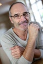 Man with eyeglasses sitting at home Royalty Free Stock Photo