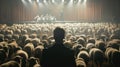 Man Facing Sheep Crowd in Auditorium: Populism Metaphor