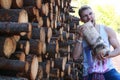 A man at the factory processing wood, sawing logs Royalty Free Stock Photo