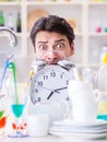 Man failing to meet the deadlines of housekeeping job Royalty Free Stock Photo