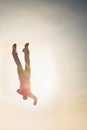 Man falling down from sky in straight position Royalty Free Stock Photo