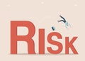 Man falls down with word risk Royalty Free Stock Photo