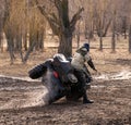 A man falls into the mud on a quad bike. Royalty Free Stock Photo