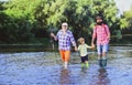 Man family fishing. Father, son and grandfather relaxing together. Grandfather and father with cute child boy are Royalty Free Stock Photo