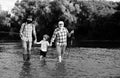 Man family fishing. Father, son and grandfather relaxing together. Grandfather and father with cute child boy are Royalty Free Stock Photo