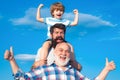 Man family outdoor. Happy three generations of men have fun and smiling on blue sky background. Grandfather father and Royalty Free Stock Photo