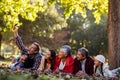Man with family taking selfie at park Royalty Free Stock Photo