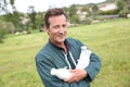 Man farmer hodling bottles of fresh milk Royalty Free Stock Photo