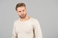 Man in fashionable tshirt, fashion. Man with bearded face and blond hair, haircut. Grooming and hair care in beauty salon, barbers Royalty Free Stock Photo