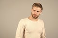 Man in fashionable tshirt, fashion. Man with bearded face and blond hair, haircut. Grooming and hair care in beauty Royalty Free Stock Photo