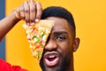 concept man happy black guy pizza fast hold delivery background smile food food Royalty Free Stock Photo