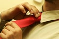 Man fastening tie Royalty Free Stock Photo