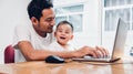 Man father using working on laptop computer