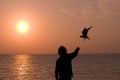 Man feeding bird Royalty Free Stock Photo