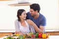 Man feeding his girlfriend Royalty Free Stock Photo