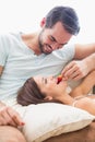 Man feeding his girlfriend a strawberry Royalty Free Stock Photo